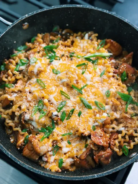 Korean spicy chicken noodle garnished 1bck7gsn7kounmumy n39v4ku6im44btw.webp.webp