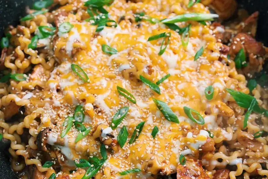 Korean spicy chicken noodle garnished 1bck7gsn7kounmumy n39v4ku6im44btw.webp.webp