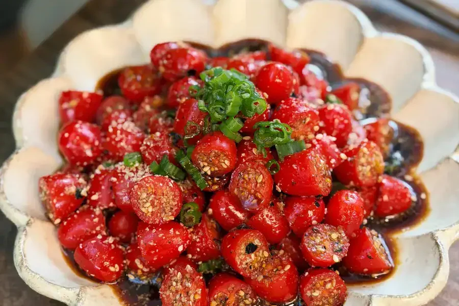 Sesame yuzu tomato salad served 1exi51ltgo4t5uobij9f5tlqczs1m82qr.webp.webp